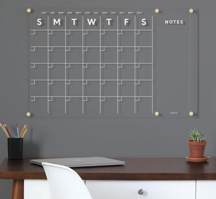 acrylic wall calendar on office wall